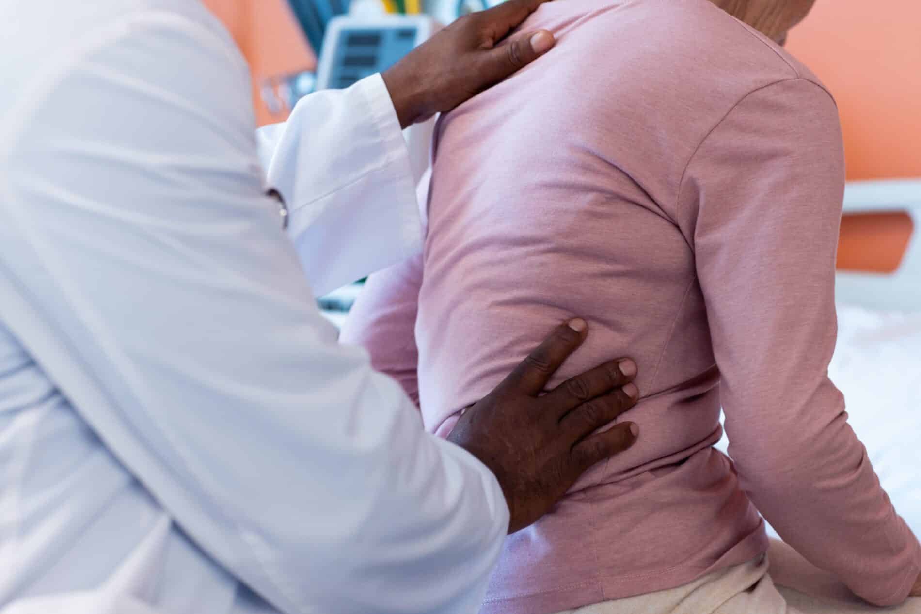 midsection of diverse senior male doctor examining 2023 11 27 05 31 12 utc scaled Theme for March – Back Pain | Innovative Health & Wellness