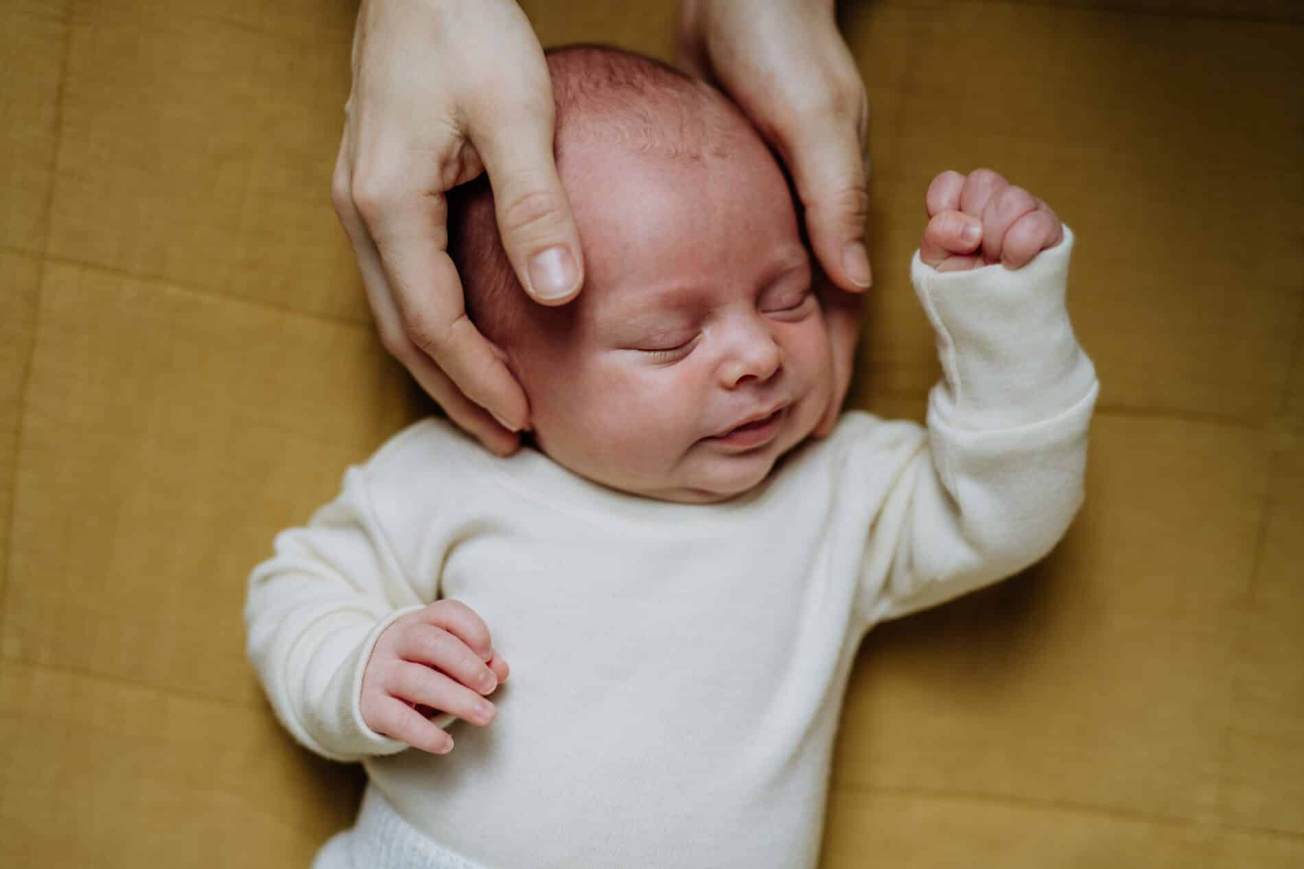 high angle view of little baby in little bed 2023 11 27 05 23 53 utc scaled Cranial Adjustments for newborns | Innovative Health