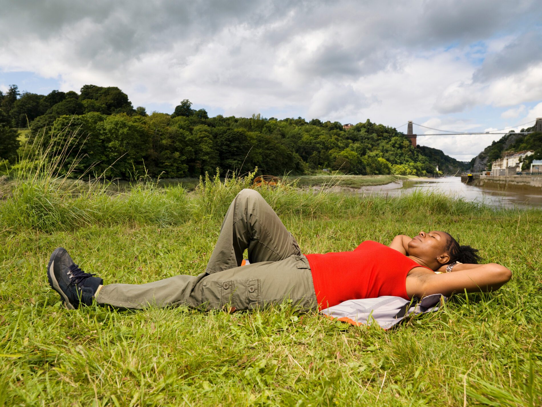 woman relaxing by river 2023 11 27 05 27 05 utc scaled Cultivating Peace of Mind With Our Tips | Innovative Health