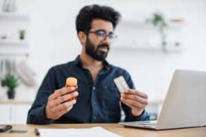 Employee With Pills Suffering From Allergy At Work 2023 06 26 21 40 44 Utc