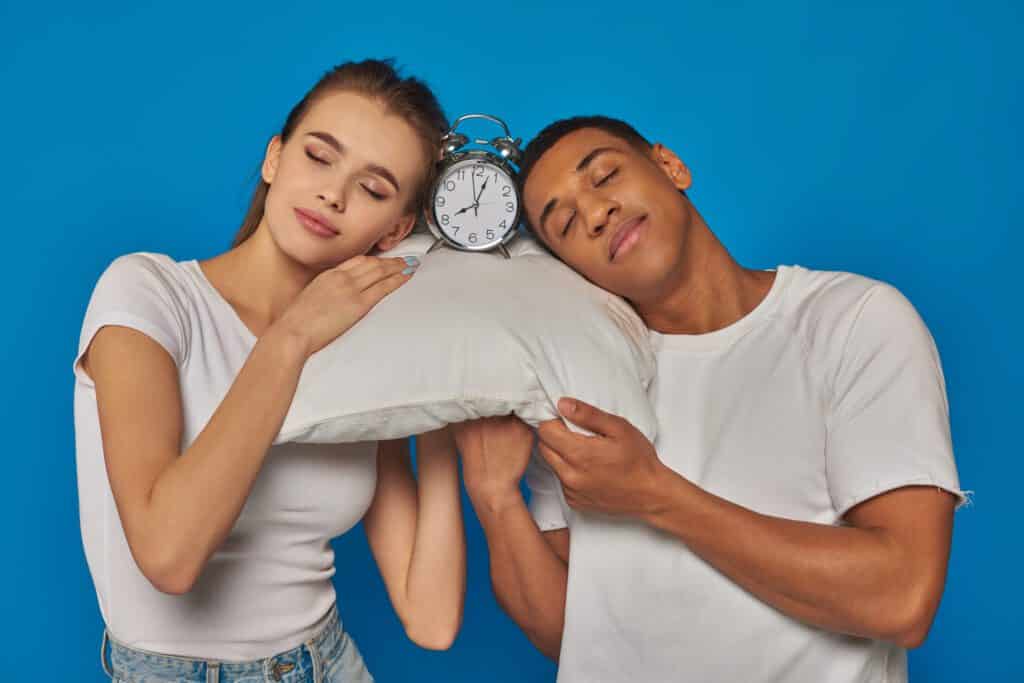 positive interracial couple sleeping together on p 2023 11 27 05 34 37 utc 1 No.1 Tips to Sleep Well and Live Well- Innovative Health Wellness