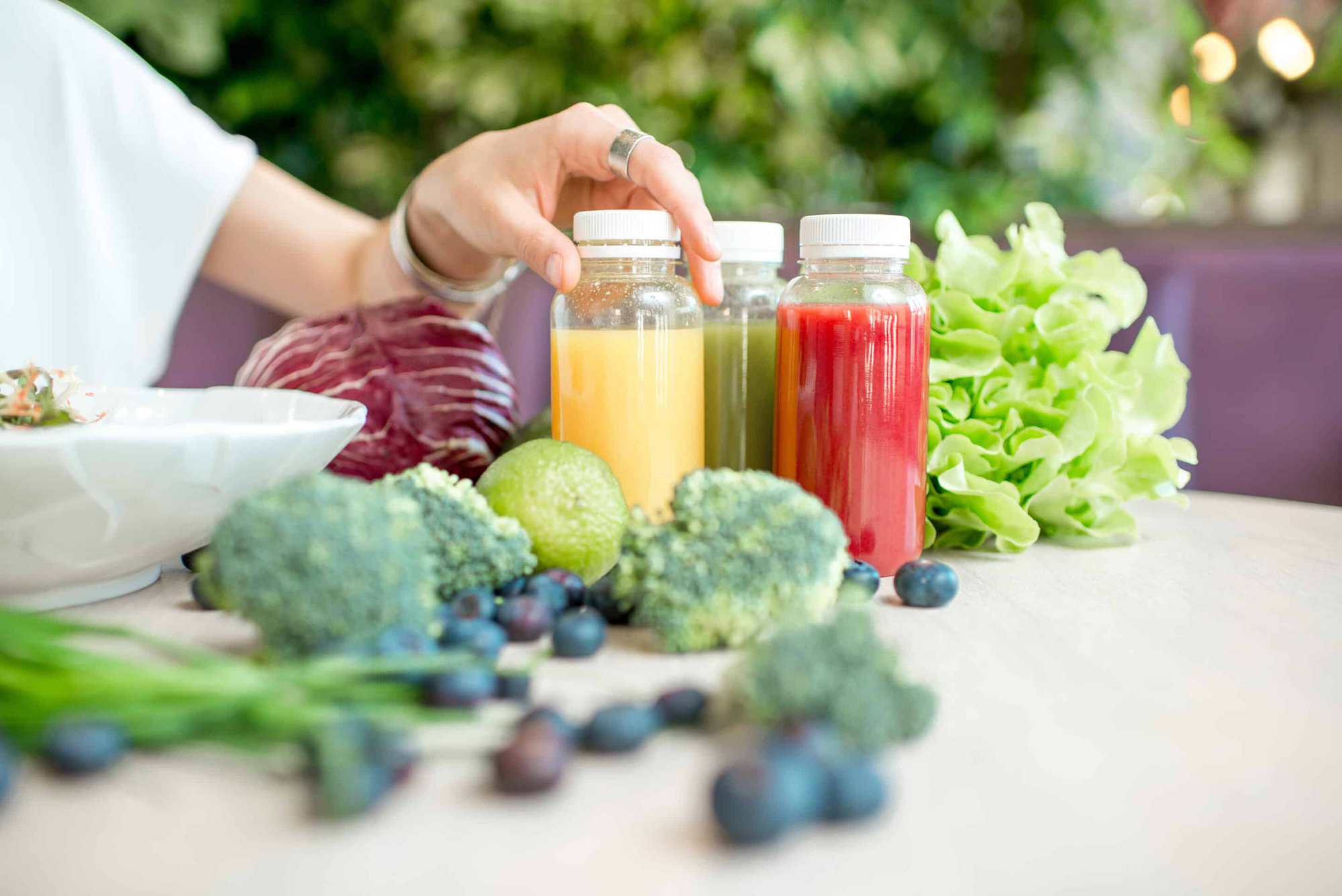 Fresh vegetables and smoothie ingredients prepared for a nutrient-focused meal