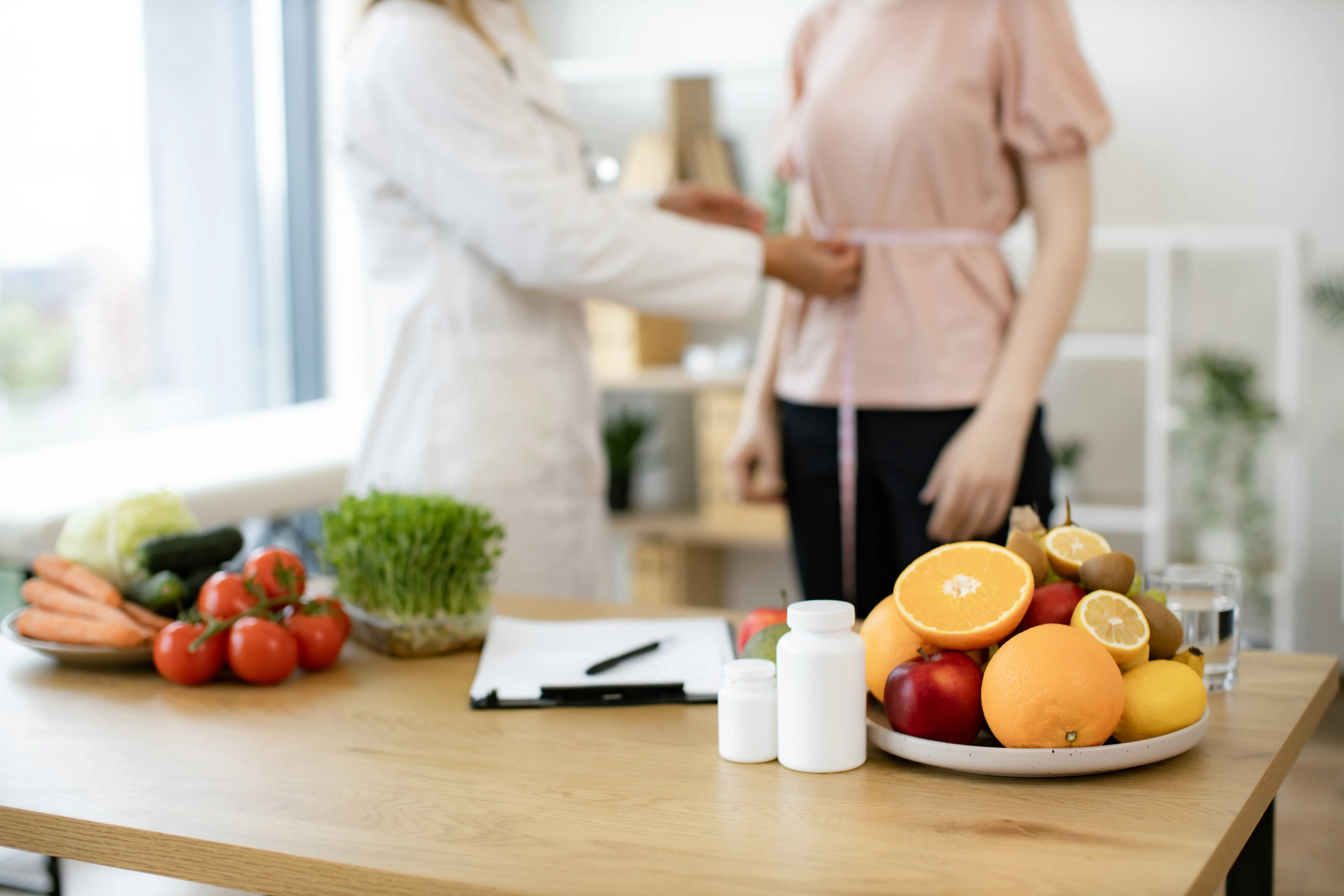 A doctor examine the woman's Digestive Health