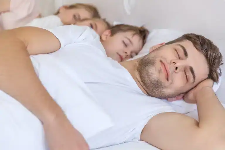 young family sleeping